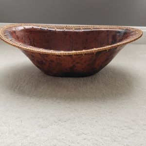 Terracota oval bowl with rattan. Made in Indonesia